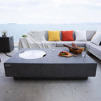 Metropolis Outdoor Fire Pit 56 In. X 32 In. Rectangular Concrete Propane Fire Table with Lava Rocks and Cover